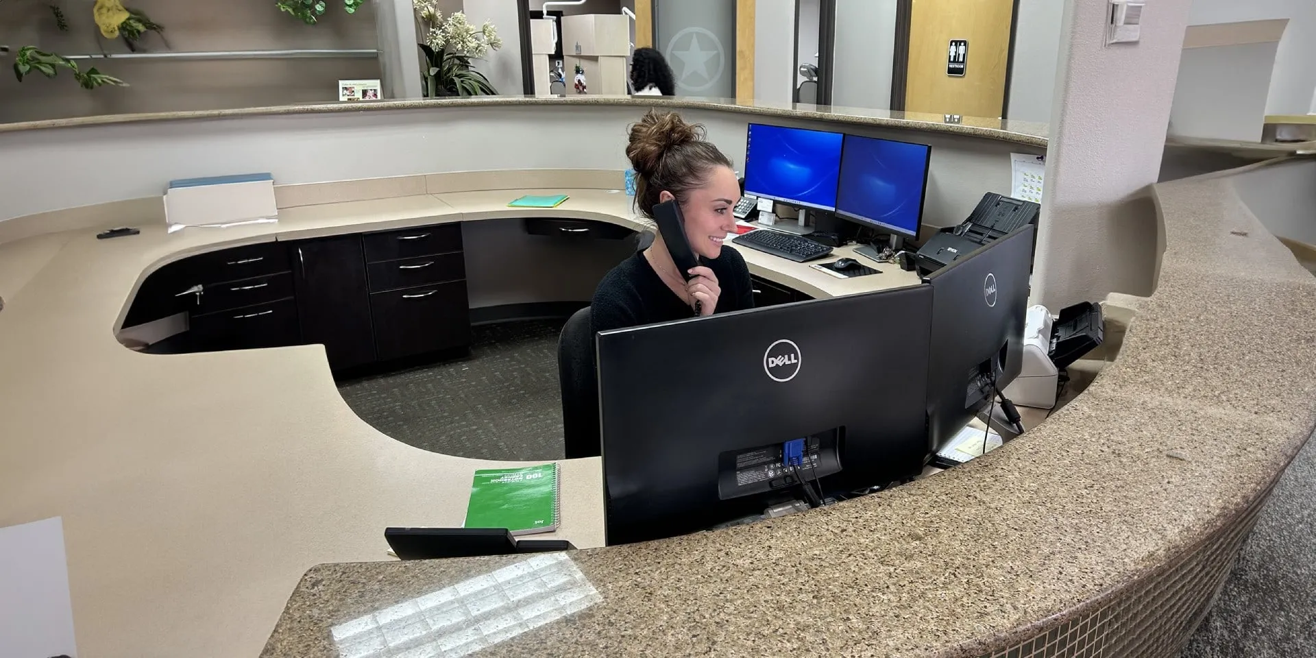 Rising Stars Pediatric staff answering phone